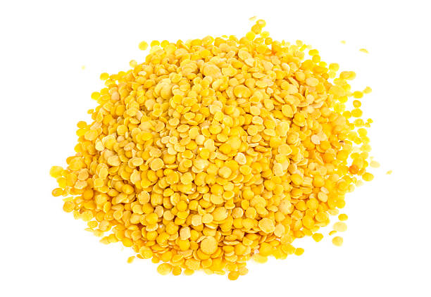 istock Yellow lentils isolated on white background. Macro shot 486206647