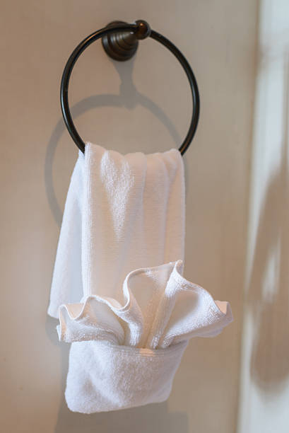 istock white hand towel on metallic hanger 486208680