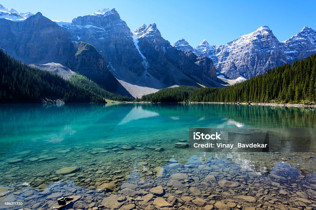 Moraine Lake on a mid-summer morning The Moraine Lake in Banff National Park, Alberta, Canada on a mid-summer morning Rocky Mountains - North America Stock Photo