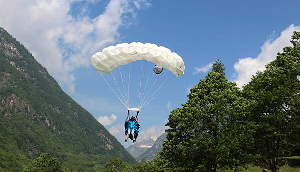 istock Parachuter comes in for touch down in Bern Canton, Switzerland. 486231766