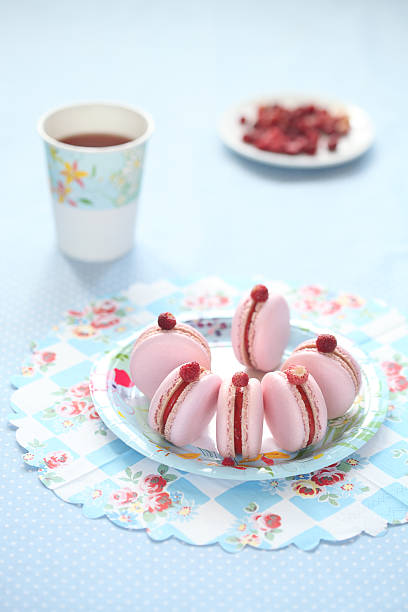 istock Pink Macarons filled with Red Berries Curd 486239313