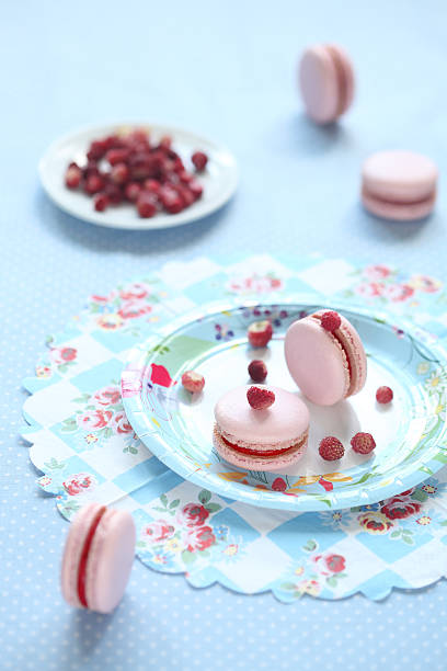 istock Pink Macarons filled with Red Berries Curd 486239319