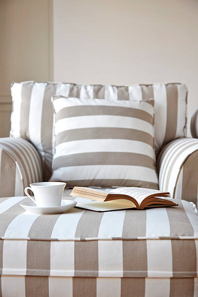 istock Living room sofa with coffee and book 486239517