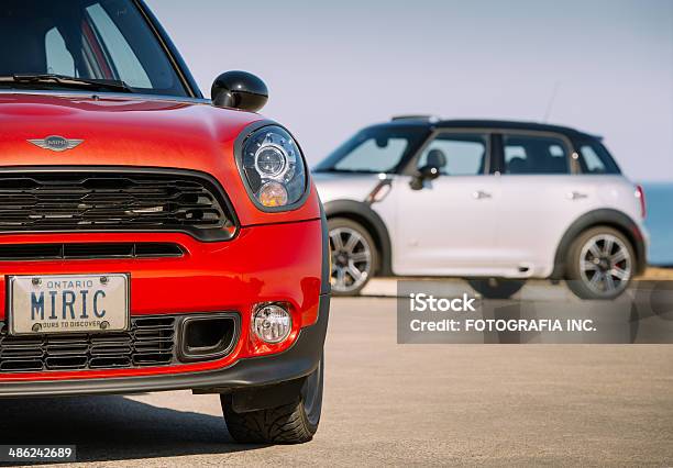 Mini Cooper Generations In Spring Time Stock Photo - Download Image Now - Alloy Wheel, BMW, Black Color