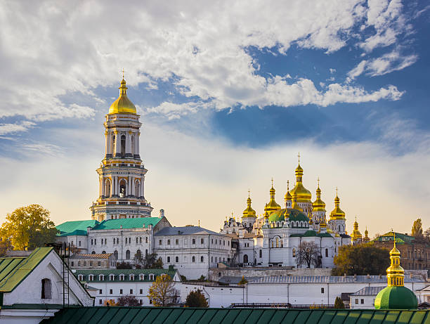 Kiev-Pechersk Lavra against the sky with clouds autumn Kiev-Pechersk Lavra against the sky with clouds autumn. Big Bell tower, Refectory Church and Assumption Cathedral. Kiev, Ukraine kyiv stock pictures, royalty-free photos & images