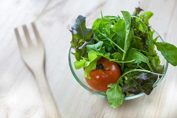 Simple low calorie mixed salad (lettuce, arugula, radicchio and cherry tomato).