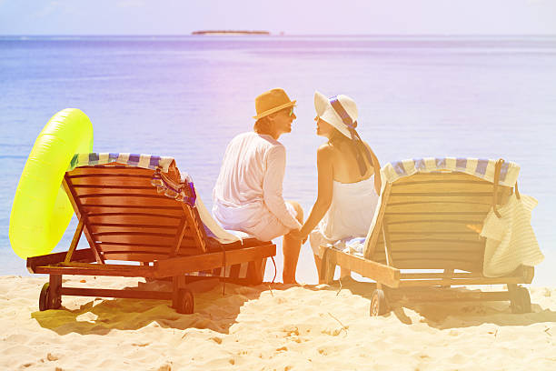 istock loving couple on tropical beach 486253512