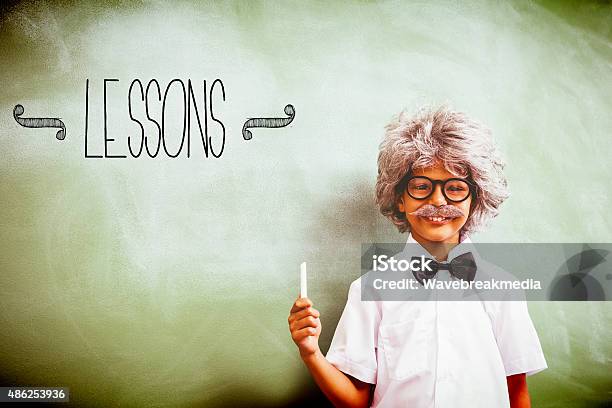 Lessons Against Boy Dressed As Senior Teacher Stock Photo - Download Image Now - Bow Tie, Boys, 2015