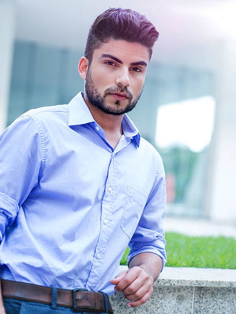 istock Young serious Hispanic businessman looking at the camera. 486254616