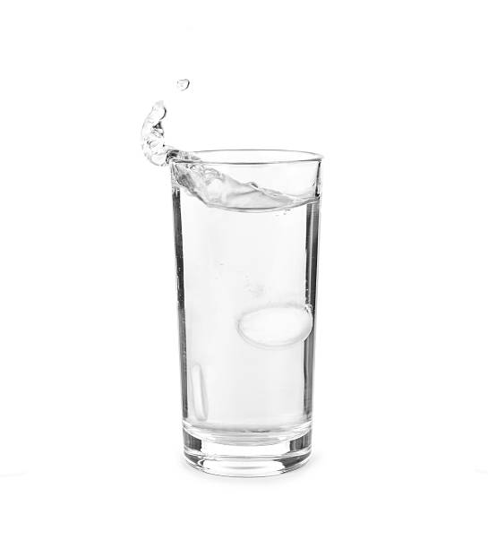 istock tablet in glass of water isolated on white 486255738