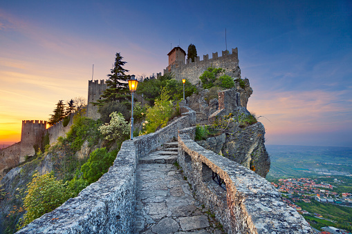 San Marino, San Marino - April 30, 2015: View of La Rocca o Guaita and the country of San Marino on april 30th during sunset.