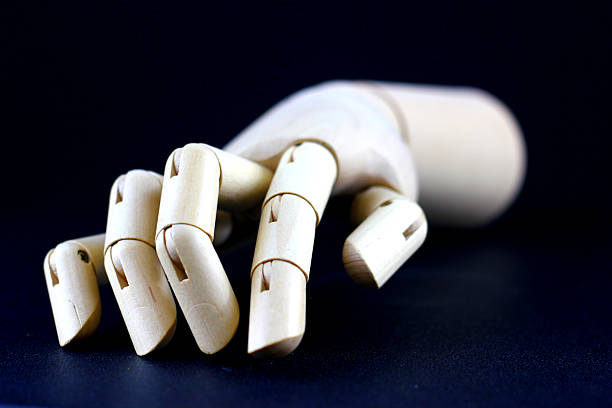 istock Wooden artists hand model 486260157