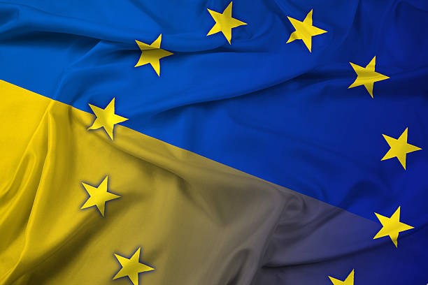 istock Waving Ukraine and EU Flag 486261725