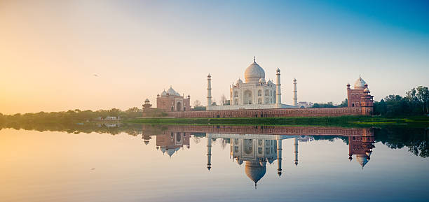Taj Mahal Agra India Panoramic image of the Taj Mahal as seen from Yamuna River, Agra. India. agra stock pictures, royalty-free photos & images