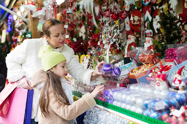 istock shopping at the Christmas market 486262728