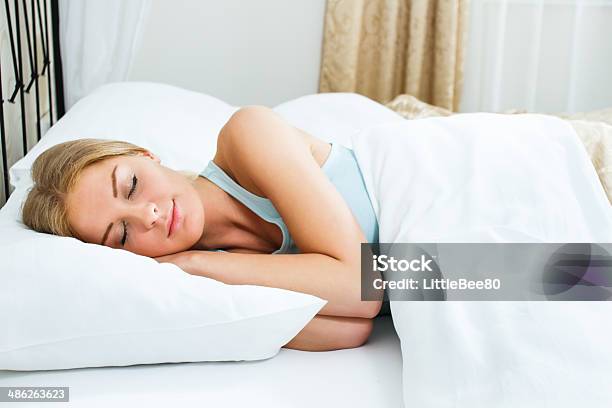 Woman Sleeping Stock Photo - Download Image Now - Bed - Furniture, Pillow, Women