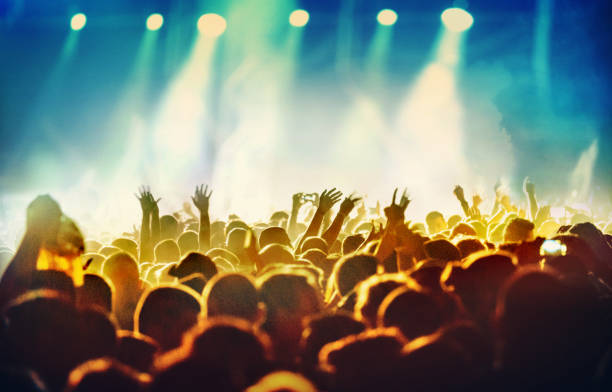 istock People at concert party. 486263708