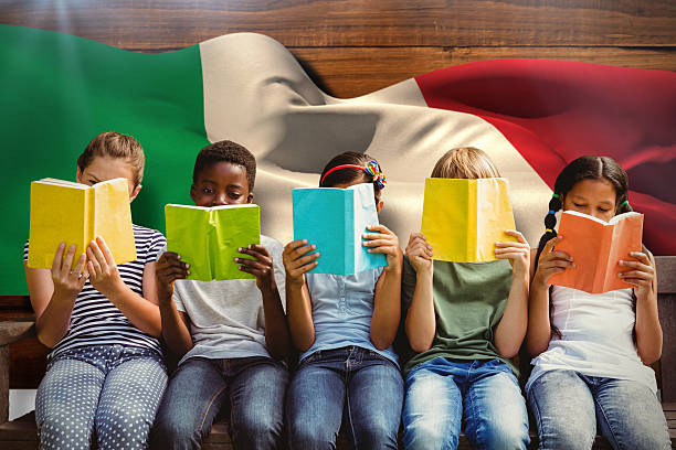 istock Composite image of children reading books at park 486271332