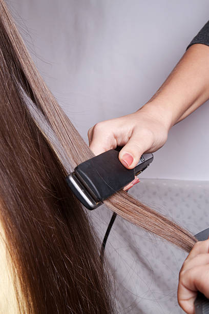 istock Beautiful Young Hairdresser 486275406