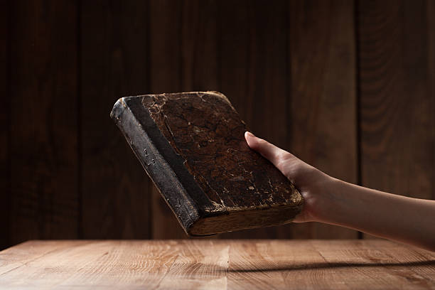 istock woman hands holding bible 486278566