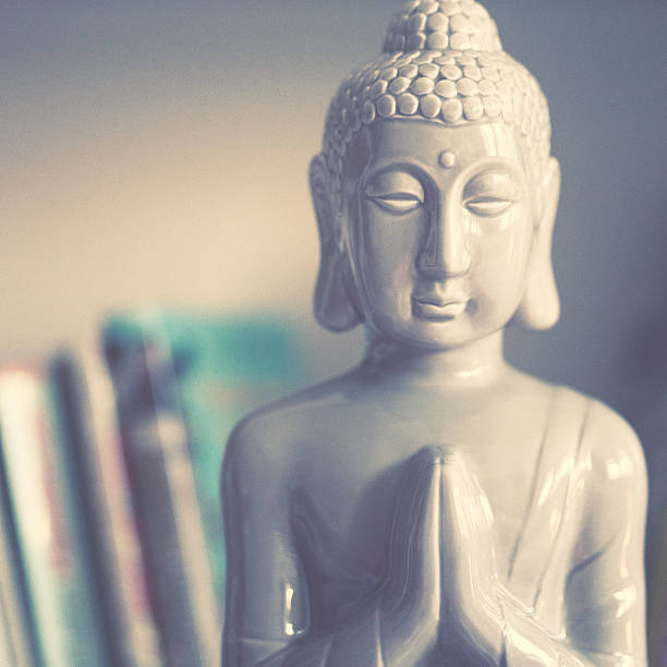 istock Little Buddha in the bookshelf 486280296