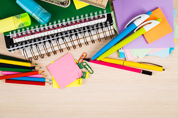 istock School and office accessories on wooden background 486283372