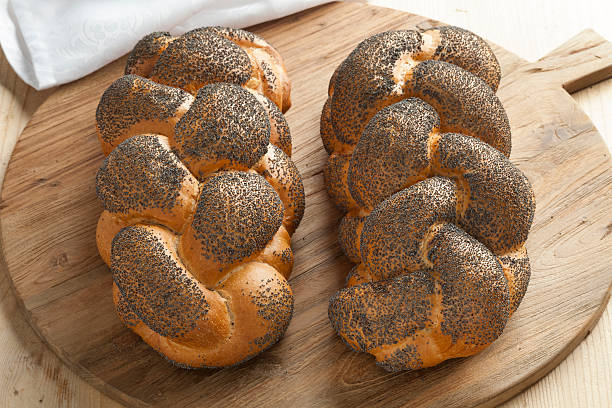 istock Whole fresh Challah bread with poppy seeds 486283848