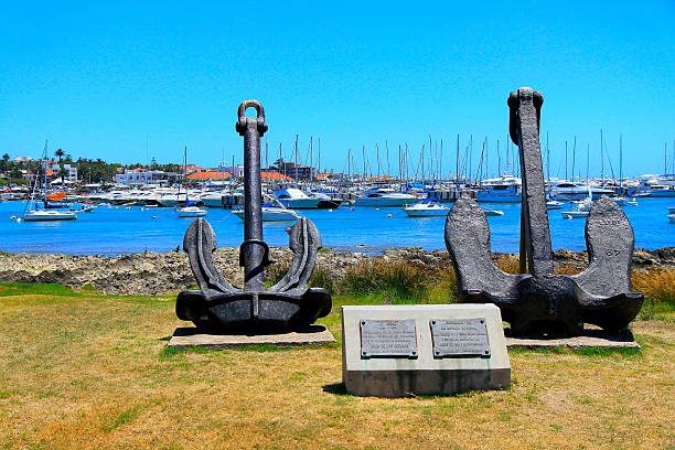 commemorating sailors the sign of an anchor has been spalled out of stone