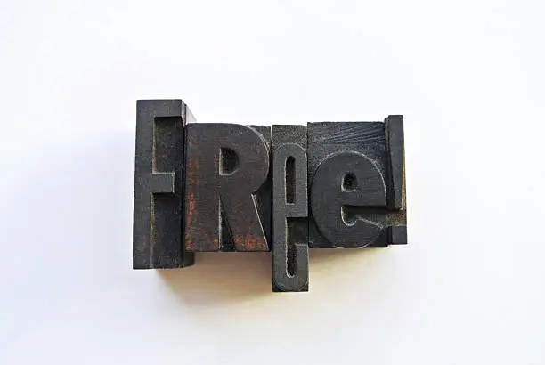 Woodtype letters giving something away for free