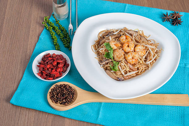 fried Hong Kong noodles topped with shrimp menu fried Hong Kong noodles topped with shrimp (shou mian chinese name menu) def picture photos stock pictures, royalty-free photos & images