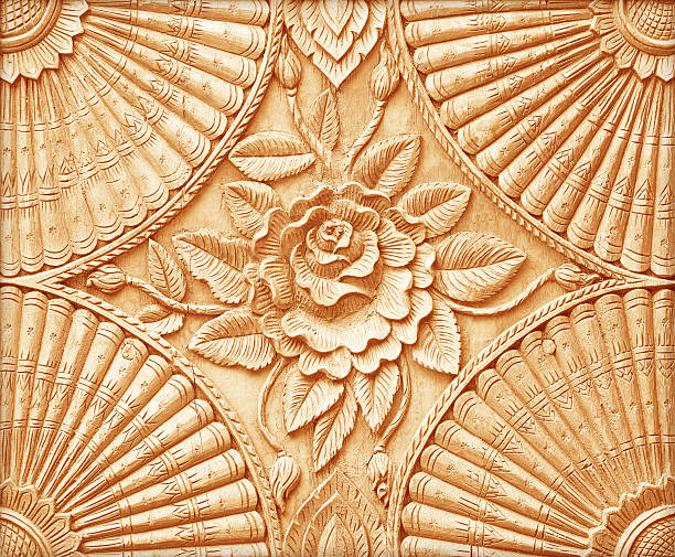 istock Pattern of flower carved on wood background 486287176