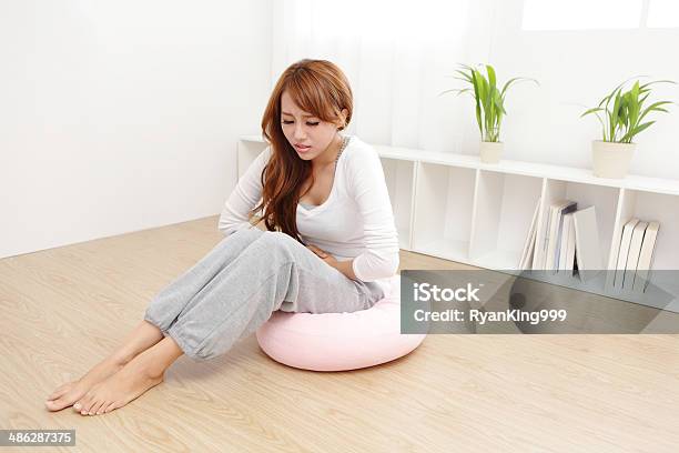 Woman With Stomach Ache Stock Photo - Download Image Now - Stomachache, Teenage Girls, Abdomen