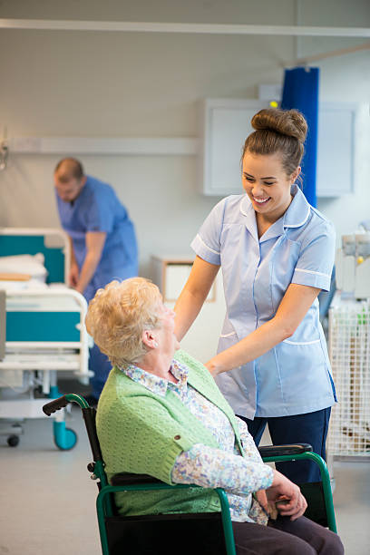 istock senior female patient in hospital 486290111