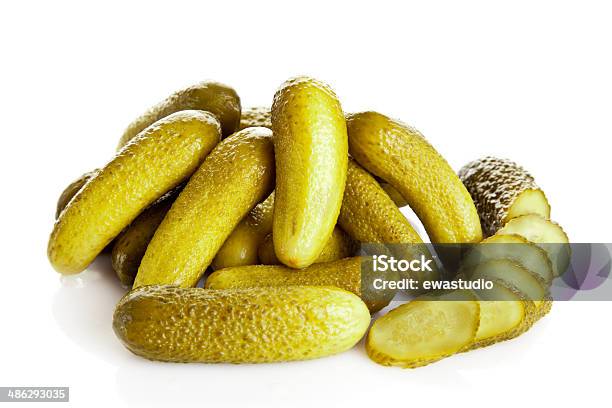 Pickled Cucumbers Gherkins On A White Background Stock Photo - Download Image Now - Appetizer, Close-up, Condiment