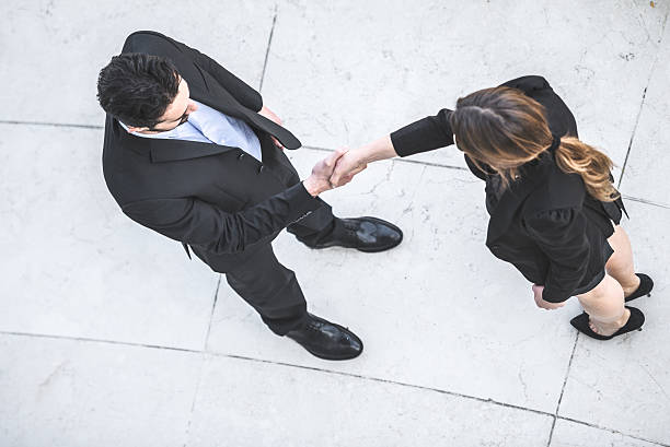 istock business handshake at meeting 486293533