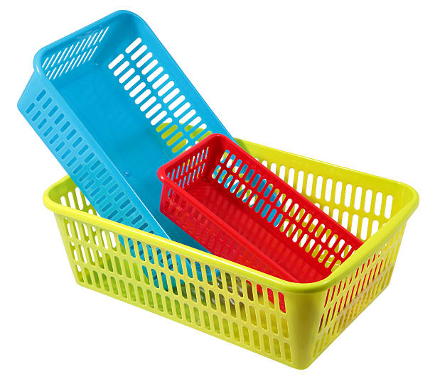 istock Set of three small colored plastic baskets empty domestic purposes 486304160