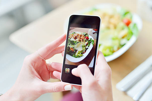 istock Smartphone taking picture from salad 486307923