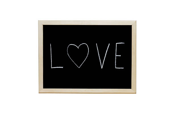 istock Love written with white chalk on blackboard. 486308568