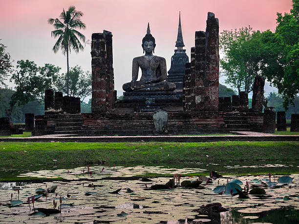 istock Ancient Buddha Statue at Wat Mahathat, Sukhothai Province, Thailand 486308983