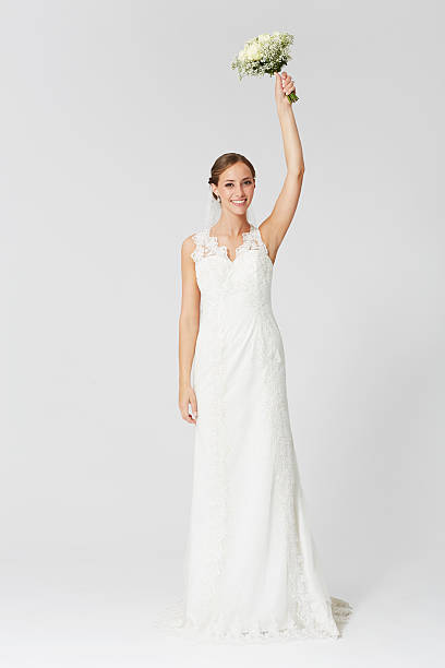 istock Happy bride ready to throw the bouquet 486308985