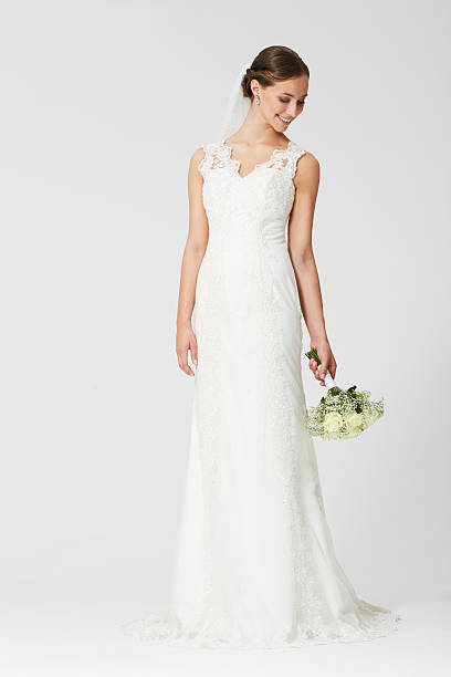 istock Happy bride with veil holding a bridal bougeut 486309011