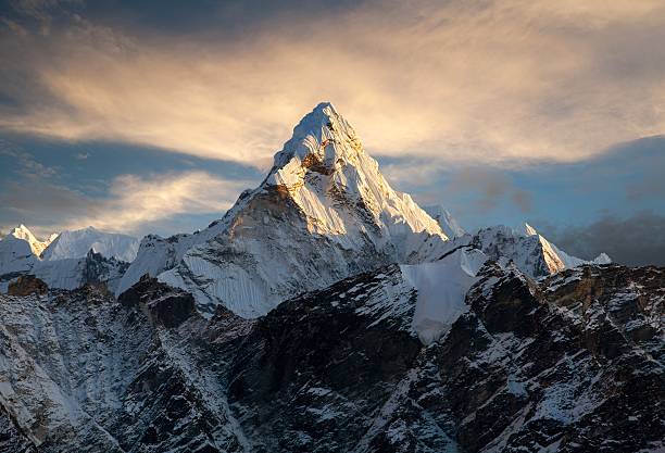 Evening view of Ama Dablam Evening view of Ama Dablam on the way to Everest Base Camp - Nepal himalayas photos stock pictures, royalty-free photos & images