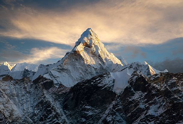 Evening view of Ama Dablam Evening view of Ama Dablam on the way to Everest Base Camp - Nepal road panoramic scenics journey stock pictures, royalty-free photos & images