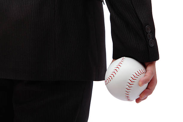 istock Business man take baseball ready to pitching 486310165