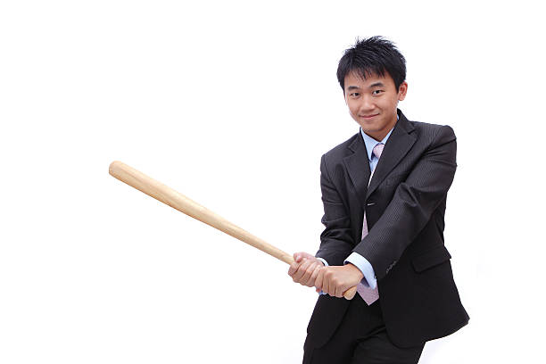 Business man holding baseball bat Business man holding baseball bat with friendly smile, it's time for homerun baseball bat home run baseball wood stock pictures, royalty-free photos & images