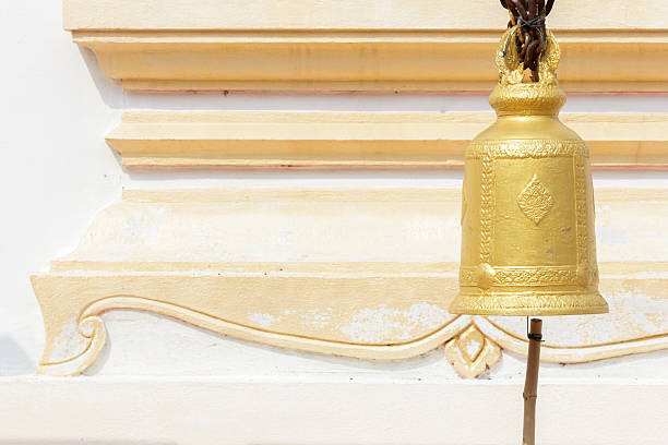 istock old brass Buddhist bell in temple. 486311629