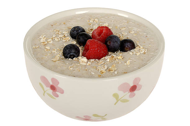 istock Bowl of Porridge with Mixed Berries 486311643