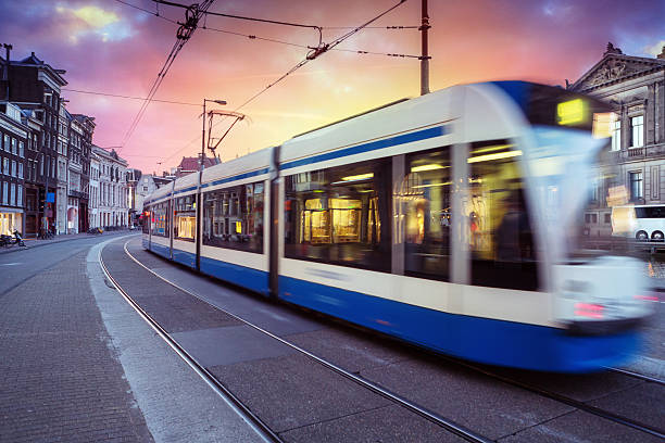 Tram in Amsterdam, The Netherlands at dusk