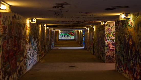 graffiti covered tunnel