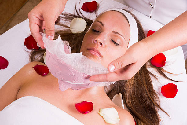 Beautiful woman at the beautician. stock photo